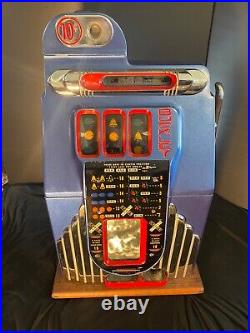 10 cent Rare This is a 1930s Buckley slot machine. In good condition