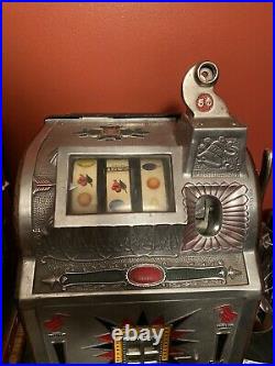 1920's mills slot machine. Works Great