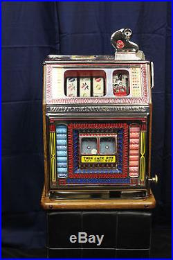 1931 5¢ Watling Blue Seal Front Vendor Twin Jackpot Gooseneck Bell Slot Machine