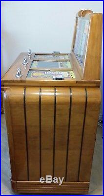 1940 antique Keeney Bonus Super Bell Three Way console slot machine