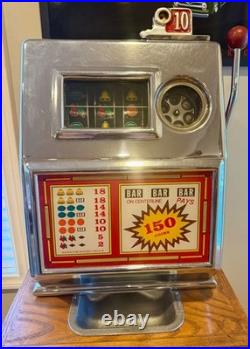 1960's Pace slot machine and cabinet it works