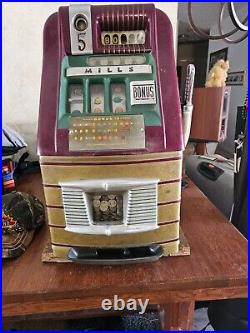 5c Old Mills Slot Machine in good condition. Works great