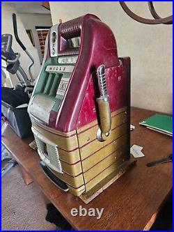 5c Old Mills Slot Machine in good condition. Works great