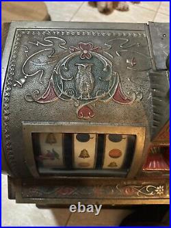 A Mills Novelty Co. Liberty Bell Five Cent Slot Machine