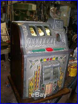 ANTIQUE MILLS SLOT MACHINE