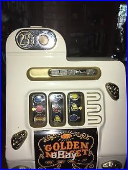 Antique 1948 Golden Nugget quarter slot machine white