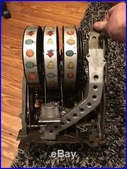 Antique Buckley Slot Machine, original condition Mills black Cherry Revamp Token