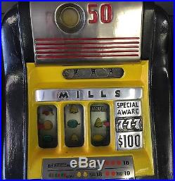 Antique Fifty Cent Mills High Top Slot Machine