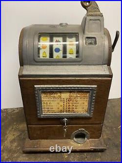 Antique Jennings 25 Cent Slot Machine