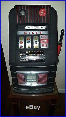 Antique Mills 1940s 5c slot machine. All original withCash Box! Fully functional