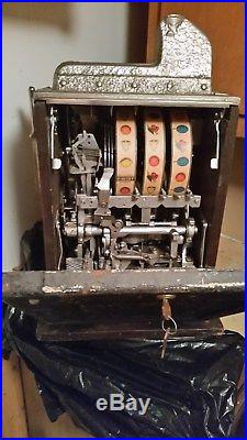 Antique Mills Dime coin slot machine