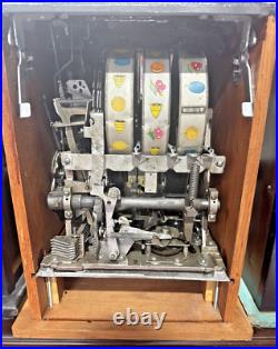 Antique Mills High Top 25 Cent Cowboy Slot Machine