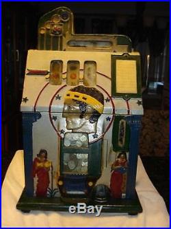 Antique Mills Roman Head 5 cent Slot Machine