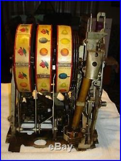 Antique Mills Roman Head 5 cent Slot Machine