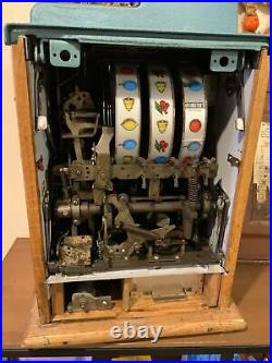 Antique Mills diamond 5 cent Nickel slot machine in working condition