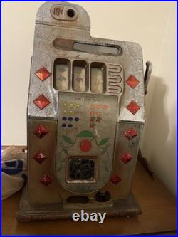 Antique Mills diamond Front Slot Machine