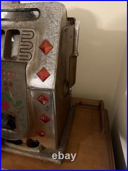 Antique Mills diamond Front Slot Machine