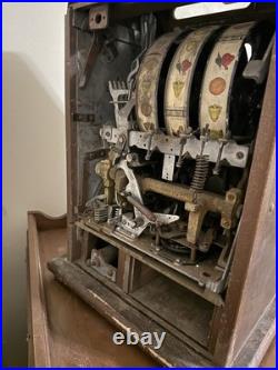 Antique Mills diamond Front Slot Machine