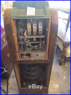 Antique Slot Machine Three Slots, Wood and Green Metal Exterior