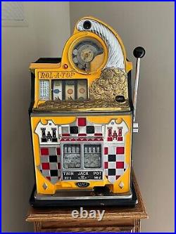 Antique Watling Rol-A-Top 1935 5 cent Slot Machine withStand