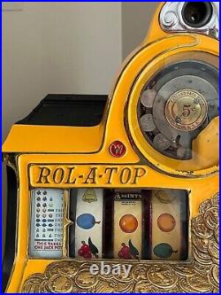 Antique Watling Rol-A-Top 1935 5 cent Slot Machine withStand