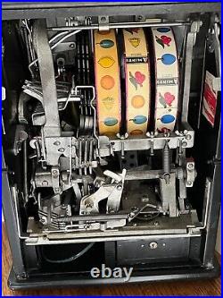 Antique Watling Rol-A-Top 1935 5 cent Slot Machine withStand