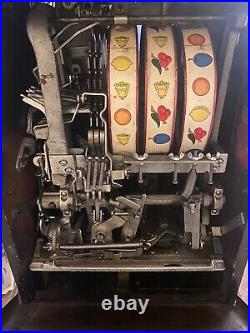 Antique Watling Rol-A-Top 1940's 5 cent Slot Machine withStand in great cond