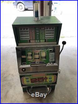Antique coin slot machine