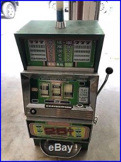 Antique coin slot machine