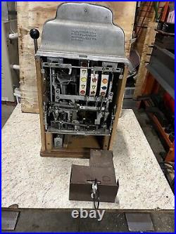 Antique jennings slot machine