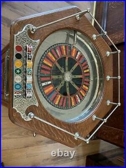 Antique slot machine Mills Roulette