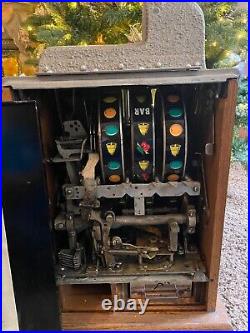 Antique slot machine. War Eagle 1927 in very good condition. Great for man cave