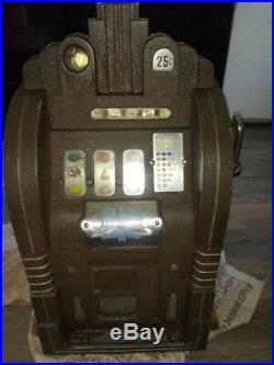 Antique vintage Mills Extraordinary 25 Cent Slot machine