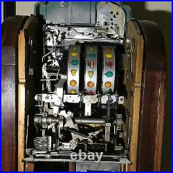 Antique vintage Mills Extraordinary slot machine