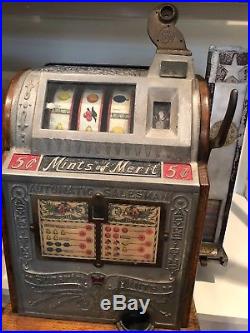 Antique working original condition slot machine with side mint vender-rare