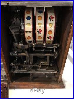 Antique working original condition slot machine with side mint vender-rare