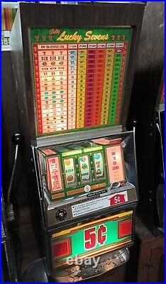 BALLY 5¢ NICKEL 1 LINE 6 COIN LUCKY SEVENS LEFT OR RIGHT SLOT MACHINE With VIDEO