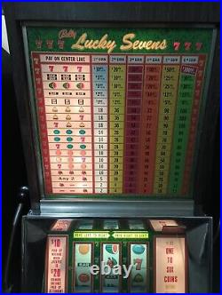 BALLY 5¢ NICKEL 1 LINE 6 COIN LUCKY SEVENS LEFT OR RIGHT SLOT MACHINE With VIDEO