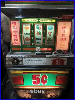 BALLY 5¢ NICKEL 1 LINE 6 COIN LUCKY SEVENS LEFT OR RIGHT SLOT MACHINE With VIDEO