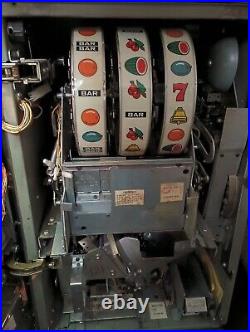 BALLY 5¢ NICKEL 1 LINE 6 COIN LUCKY SEVENS LEFT OR RIGHT SLOT MACHINE With VIDEO