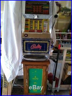 Bally vintage slot machine 25 cent with stand