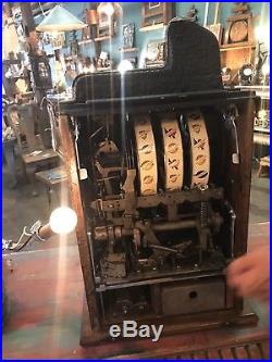 Beautifully restored 1931 Mills Peacock 5 cent Slot Machine mint vendor