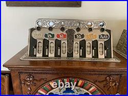 Caille double puck antique slot machine