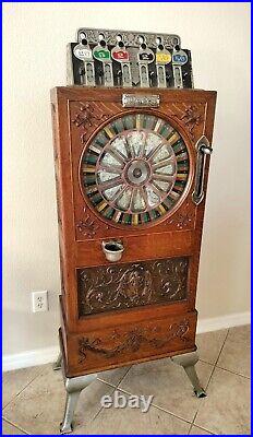 Circa 1898 Calle Bros. PUCK Upright Slot Machine Stunning