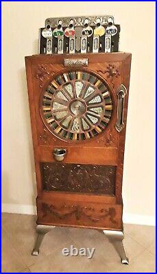 Circa 1898 Calle Bros. PUCK Upright Slot Machine Stunning