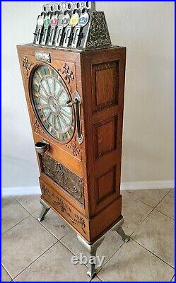 Circa 1898 Calle Bros. PUCK Upright Slot Machine Stunning