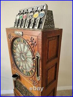 Circa 1898 Calle Bros. PUCK Upright Slot Machine Stunning