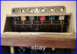 Circa 1898 Calle Bros. PUCK Upright Slot Machine Stunning