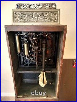 Circa 1898 Calle Bros. PUCK Upright Slot Machine Stunning