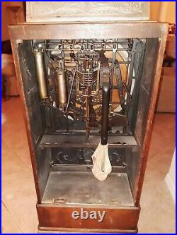 Circa 1898 Calle Bros. PUCK Upright Slot Machine Stunning